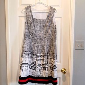 Cleo Designer Size 12. Back zipper. Simply elegant! Knee length.
